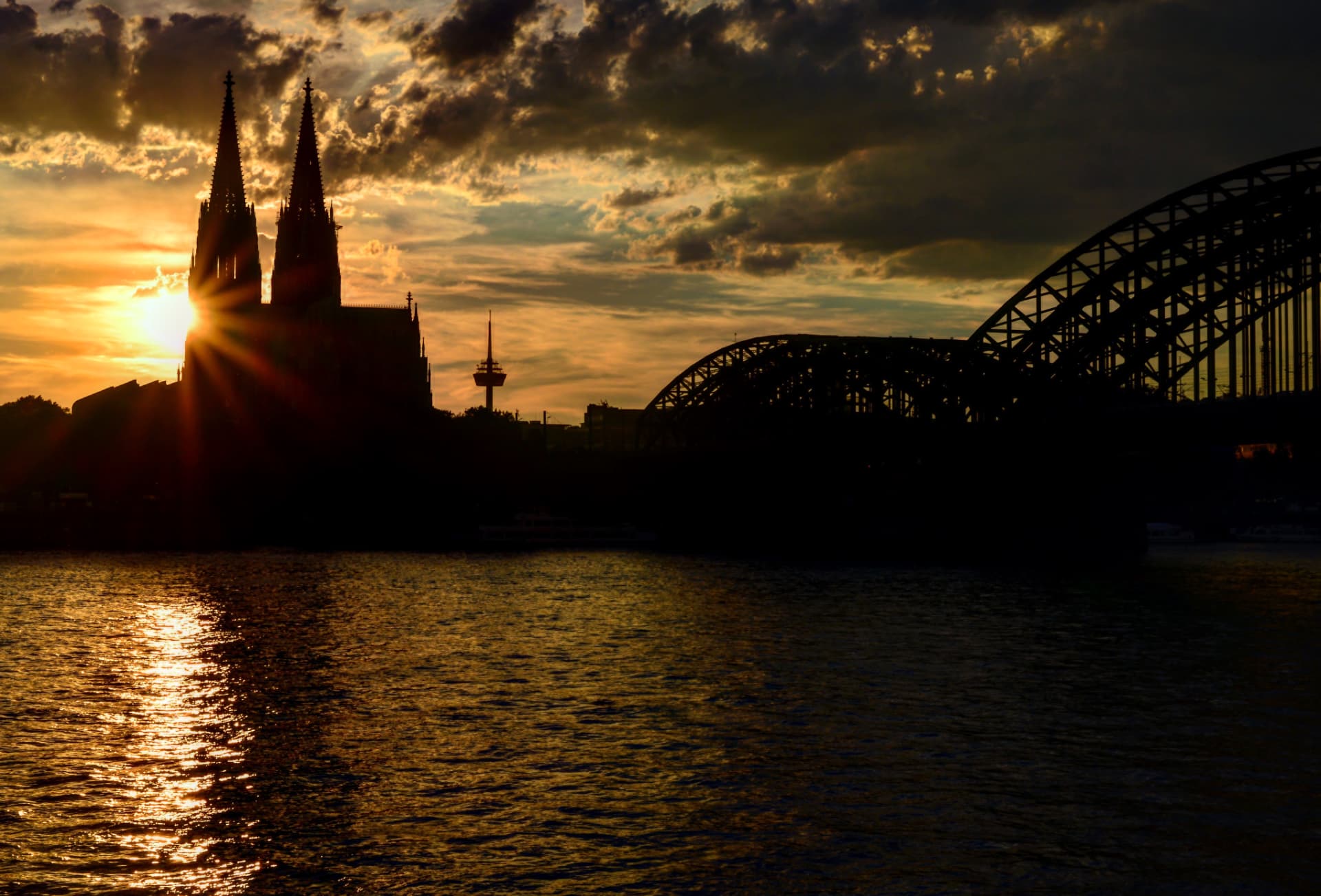 Cathedral and bridge at sundown, Cologne, Germany